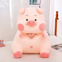 Adorable soft pig toy with pink cheeks, a heart-shaped 'Love' pendant, and a plush design, perfect for cuddling and gifting.