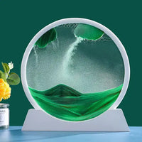 Moving Sand Art Picture Frame with green and white sand creating dynamic landscapes against a dark green background. Perfect for home decor and relaxation.