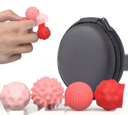 Red and pink sensory magnetic ball toy for children with textured silicone balls and a compact black case, ideal for fidgeting and stress relief.
