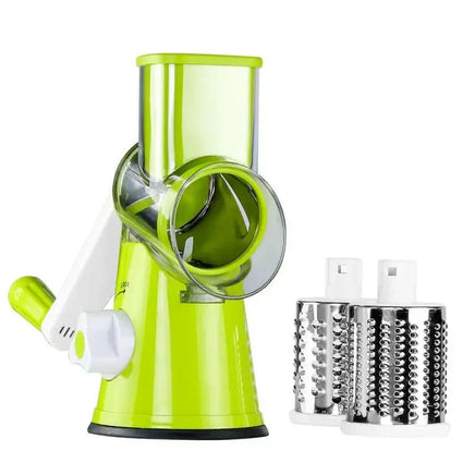 Green vegetable cutter kitchen gadget with rotary grater and two detachable stainless steel blades for slicing and shredding.