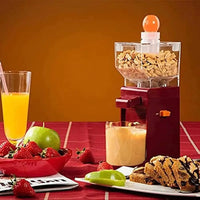 Electric Peanut Butter Grinder on a dining table with fresh peanut butter, fruits, and juice, perfect for homemade spreads.