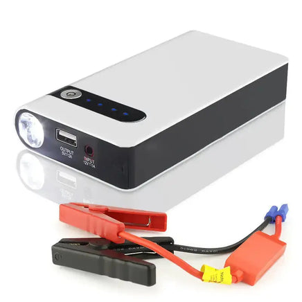 Car jump starter with LED flashlight and clamps, featuring USB and input ports for emergency vehicle and power bank use.