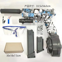 Black and white graffiti-style automatic airsoft gun toy set with goggles, magazines, and a charger, suitable for children’s games.