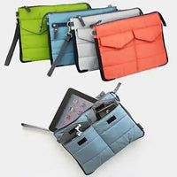 GO GO Gadget Pouch in multiple colors with compartments for organizing gadgets, ideal for packing and switching between bags.