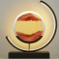 3D Quicksand Table Lamp with mesmerizing sand art in a circular frame, emitting warm ambient light on a sleek black base.