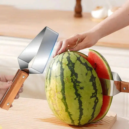 Watermelon splitter cutting through a whole watermelon with a wooden handle and stainless steel blade, ideal for effortless fruit slicing.