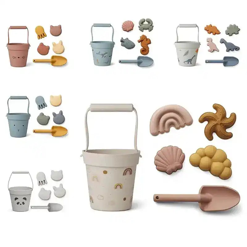 Collection of various beach toy sets featuring different themes, including animals, dinosaurs, and ocean creatures, perfect for summer play.