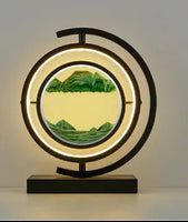 Elegant 3D Quicksand Table Lamp featuring green landscape sand art and a sleek black base, ideal for modern interiors.