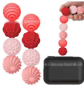 Sensory magnetic ball toy for children ages 4-6 in red and pink tones with textured silicone balls and a black zippered case for stress relief play.