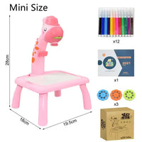 Mini-sized Kids Art Table Set with a pink giraffe projector, markers, stencil discs, an art booklet, and packaging for gifting.