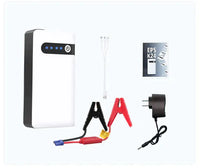 Car jump starter kit with clamps, USB cable, and charger, designed for emergency vehicle repair and portable power needs.