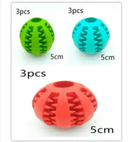 Three interactive rubber slow feeder dog balls in green, red, and blue, each measuring 5cm, designed for small dogs.