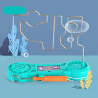 Teal electric bump maze toy with orange wand, set against a playful background with decorative elements.