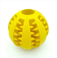 Yellow interactive rubber slow feeder dog ball with ridges for treat dispensing, designed for engaging play.