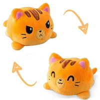 Orange cat double-sided plush toy with reversible angry and happy expressions. Cute and cuddly from Shop Name.