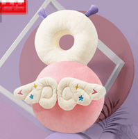 Toddler head protection pad with plush donut shape and winged design
