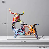 Multicolor Modern Art Graffiti Cow Figurine with graffiti patterns, measuring 20.5cm x 21.5cm x 9cm for artistic decor.