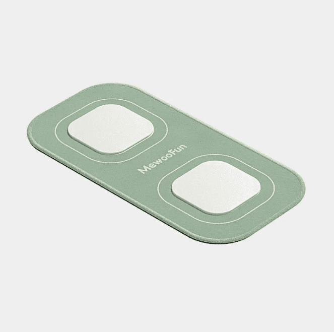 Light green 4-in-1 pet chatter button with white labels for dog communication, durable silicone material, compact size for easy use.