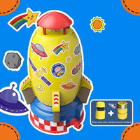 Yellow Rocket Launcher Toy with colorful stickers, faucet connection, and water spray feature for outdoor fun.