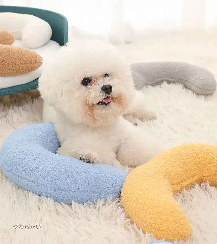 Dog resting on U-shaped pet pillow
