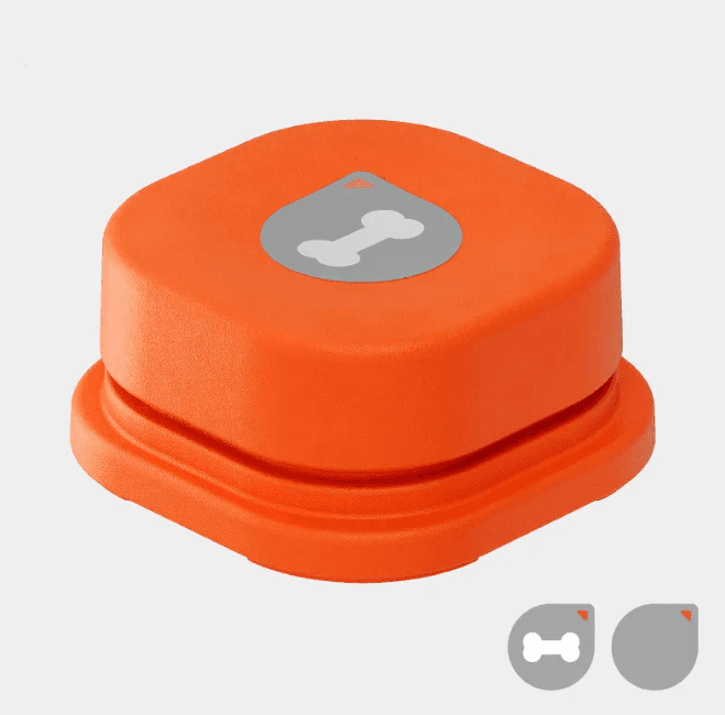 Orange durable pet chatter button with gray bone sticker for dog communication, compact square shape, easy to press for interaction