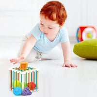 Toddler playing with the Baby Blocks Shape Sorter Toy, showcasing its colorful design and educational benefits for early development.