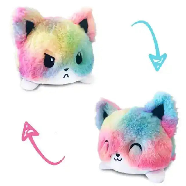 Rainbow-colored cat double-sided plush toy with reversible angry and happy expressions. Soft and fun from Shop Name.