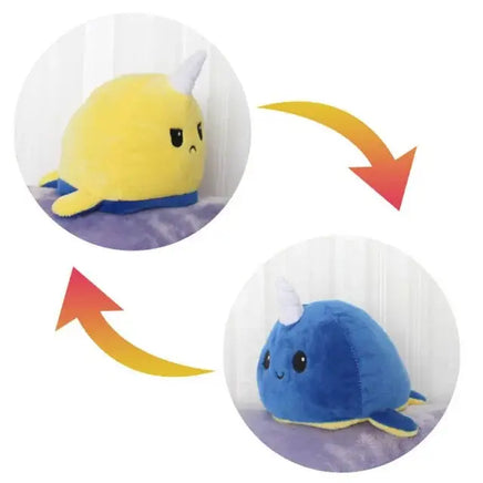 Yellow and blue narwhal double-sided plush toy with reversible sad and happy expressions. Cute and cuddly from Shop Name.