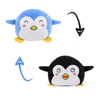 Blue and black penguin double-sided plush toy with reversible happy expressions. Soft and fun from Shop Name.