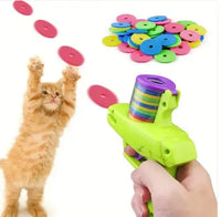 Interactive Cat Toy Launcher firing colorful foam discs with kitten leaping to catch. Perfect for safe and engaging indoor cat play.