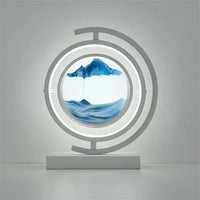 Minimalist 3D Quicksand Table Lamp showcasing blue sand art in a white circular frame, perfect for contemporary spaces.