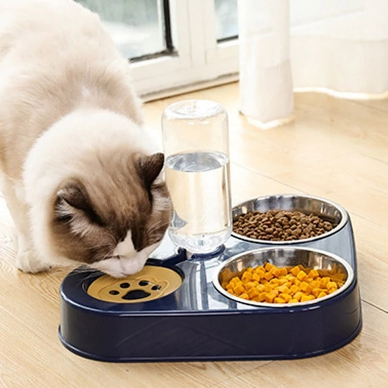 Cat eating from blue 3in1 Pet Food Bowl with water dispenser and dual food trays, designed for clean and organized feeding.