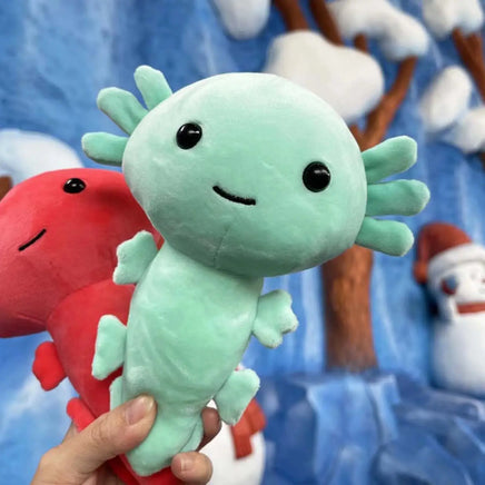 Mint green anime axolotl plush toy held in front of a winter-themed background, featuring a cheerful design.