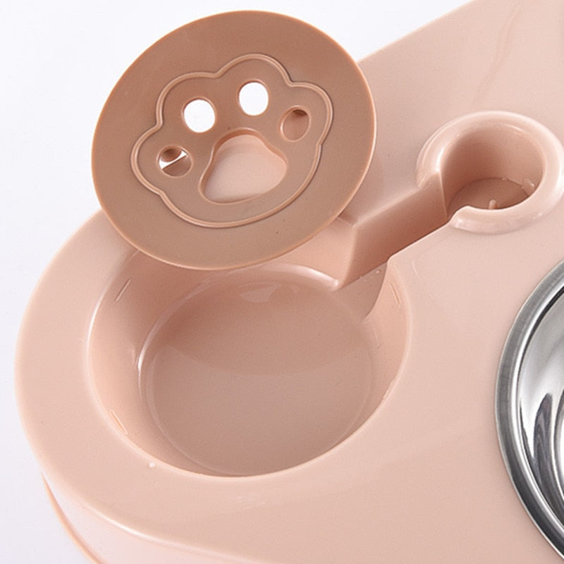 Close-up of paw-shaped water outlet on pink 3in1 Pet Food Bowl, showcasing innovative hydration feature for pets.
