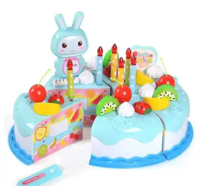 Blue cake toy set for kids with detachable slices, fruit toppings, candles, and a bunny figure for imaginative play.