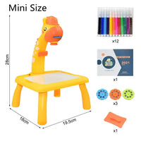 Mini-sized Kids Art Table Set with a yellow giraffe projector, markers, stencil discs, and an art booklet for creative activities.