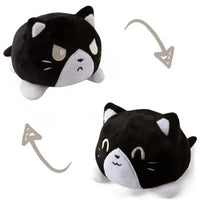 Black and white cat double-sided plush toy with reversible angry and happy expressions. Soft and fun from Shop Name.