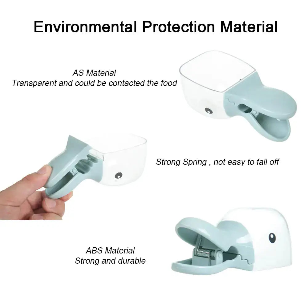 Pet Food Spoon made of AS material, transparent and safe for food contact, featuring a strong spring for secure use and ABS material for durability.