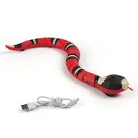 Red and black electronic snake toy with USB charging cable, designed for interactive play with cats. Durable and lifelike design.