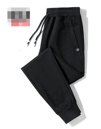 Crossfit Track Sweatpants in black featuring a sleek design with adjustable drawstrings, zippered pockets, and cuffed ankles for gym and sportswear.