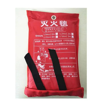 Red-packaged Fire Blanket Emergency Fiberglass Cloth with black pull tapes, labeled with fire safety instructions in multiple languages.