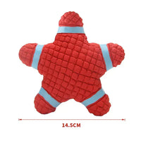 Red star-shaped squeaky dog toy with textured surface and blue accents, measuring 14.5 cm, perfect for interactive pet play.