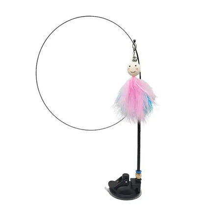 Fishing rod-style cat toy with a smiling face and colorful feather attachment, mounted on a suction cup base for interactive play.