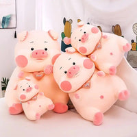 Set of soft pig toys in various sizes, featuring pink accents and heart pendants, perfect for collections or gifting.