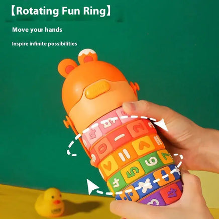 Children's Creative Educational Tumbler with rotating fun ring featuring colorful numbers and symbols, promoting interactive learning.