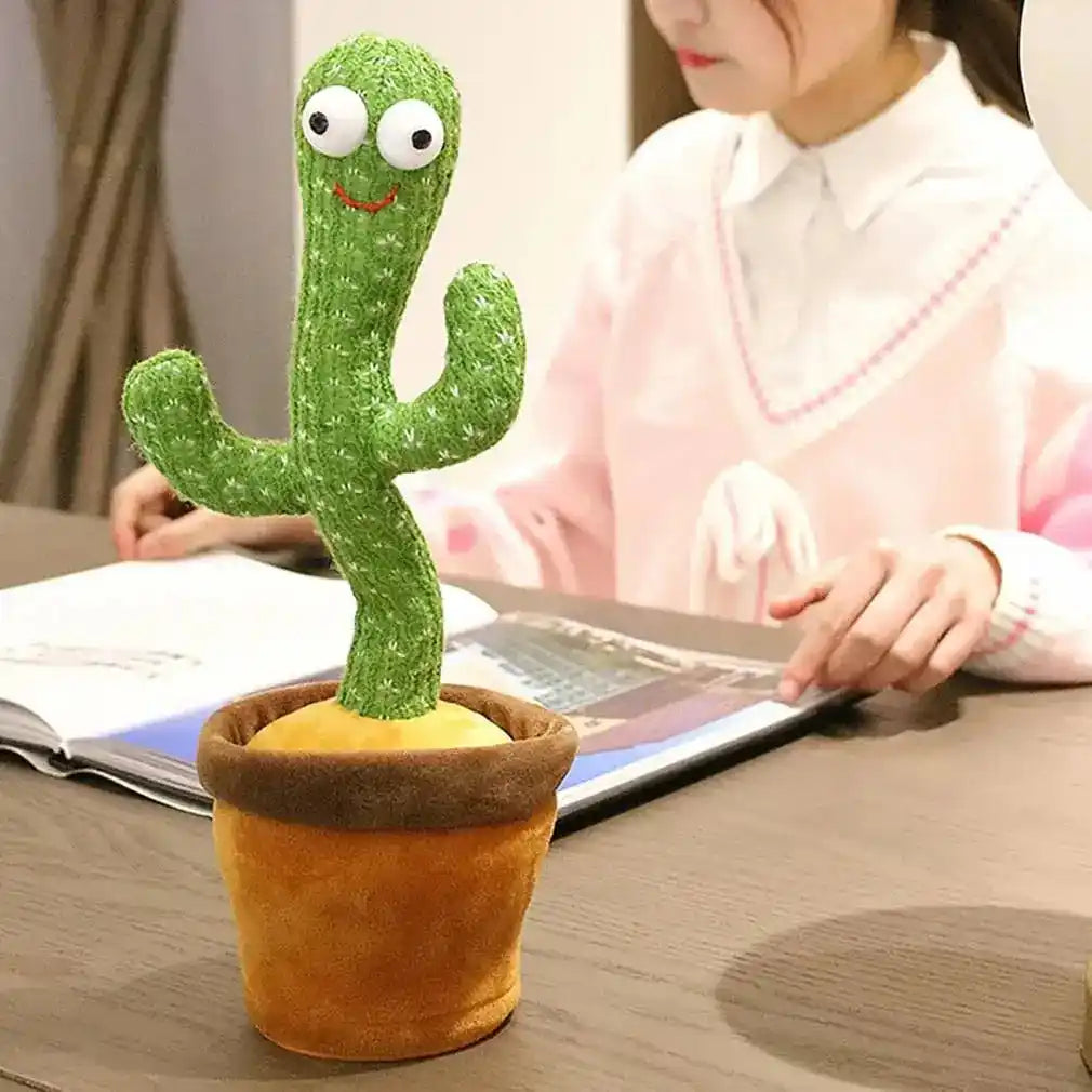 Single dancing cactus toy in a brown pot on a desk, with a child in the background, highlighting its playful and speaking features.