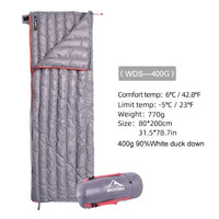 Grey portable sleeping bag with 90% white duck down, designed for outdoor camping. Provides warmth, breathability, and lightweight comfort.