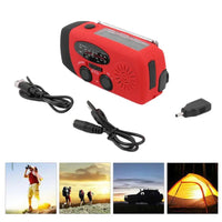 Emergency radio with accessories including USB cables and adapter, ideal for outdoor activities like camping and hiking.