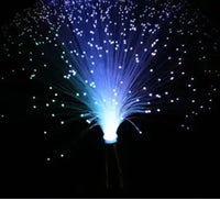 LED fiber optic lamp emitting soft blue light with glowing fiber tips, enhancing any room's atmosphere.