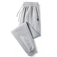 Crossfit Track Sweatpants in light gray color with elastic waistband, drawstring, and tapered cuffs, ideal for gym and sportswear.